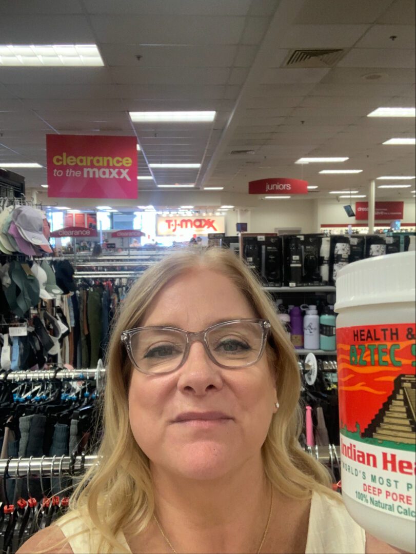 A woman smiling | Aztec Secret Health & Beauty LTD